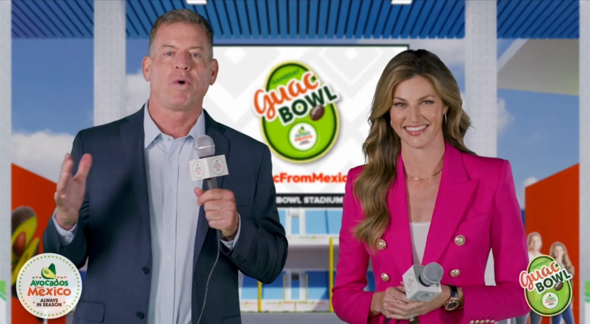 Troy Aikman and Erin Andrews with microphones in front of the Guac Bowl logo