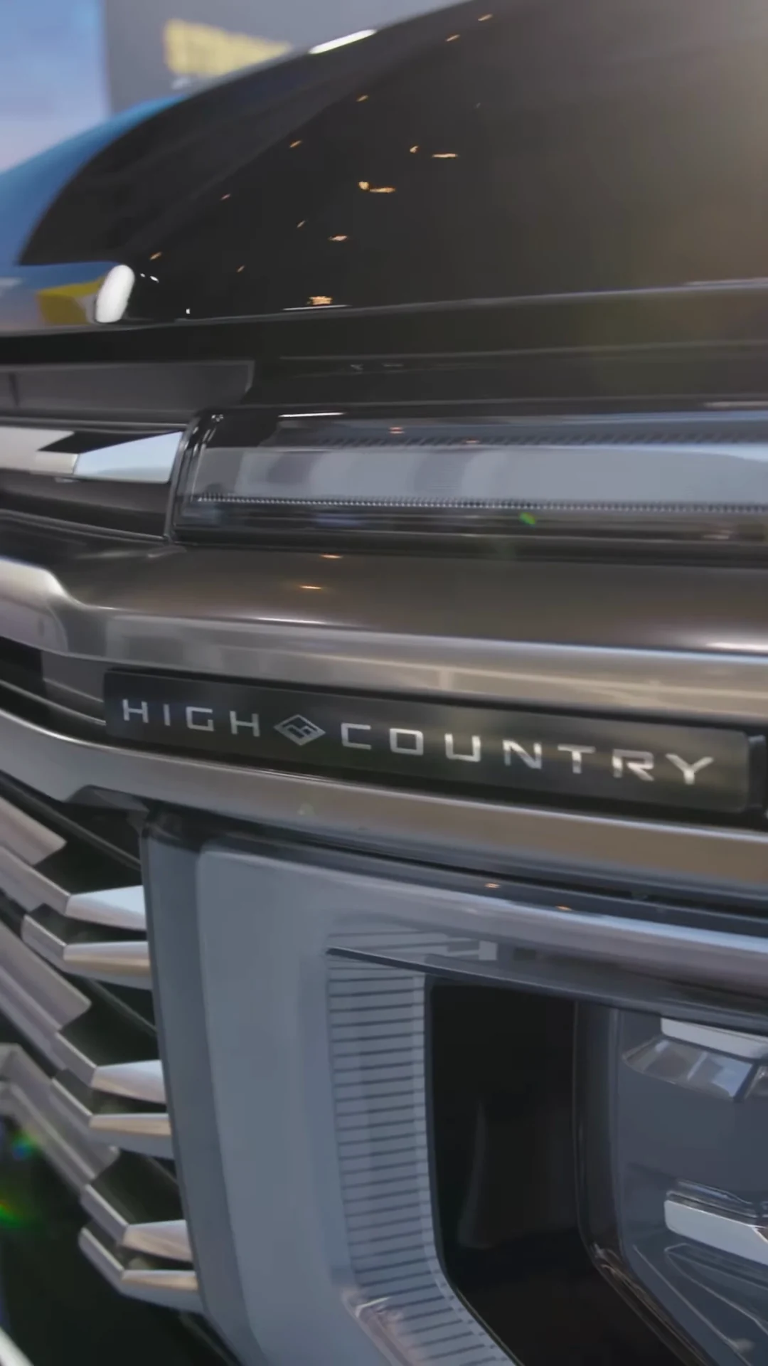 The High Country badge across a Silverado grille