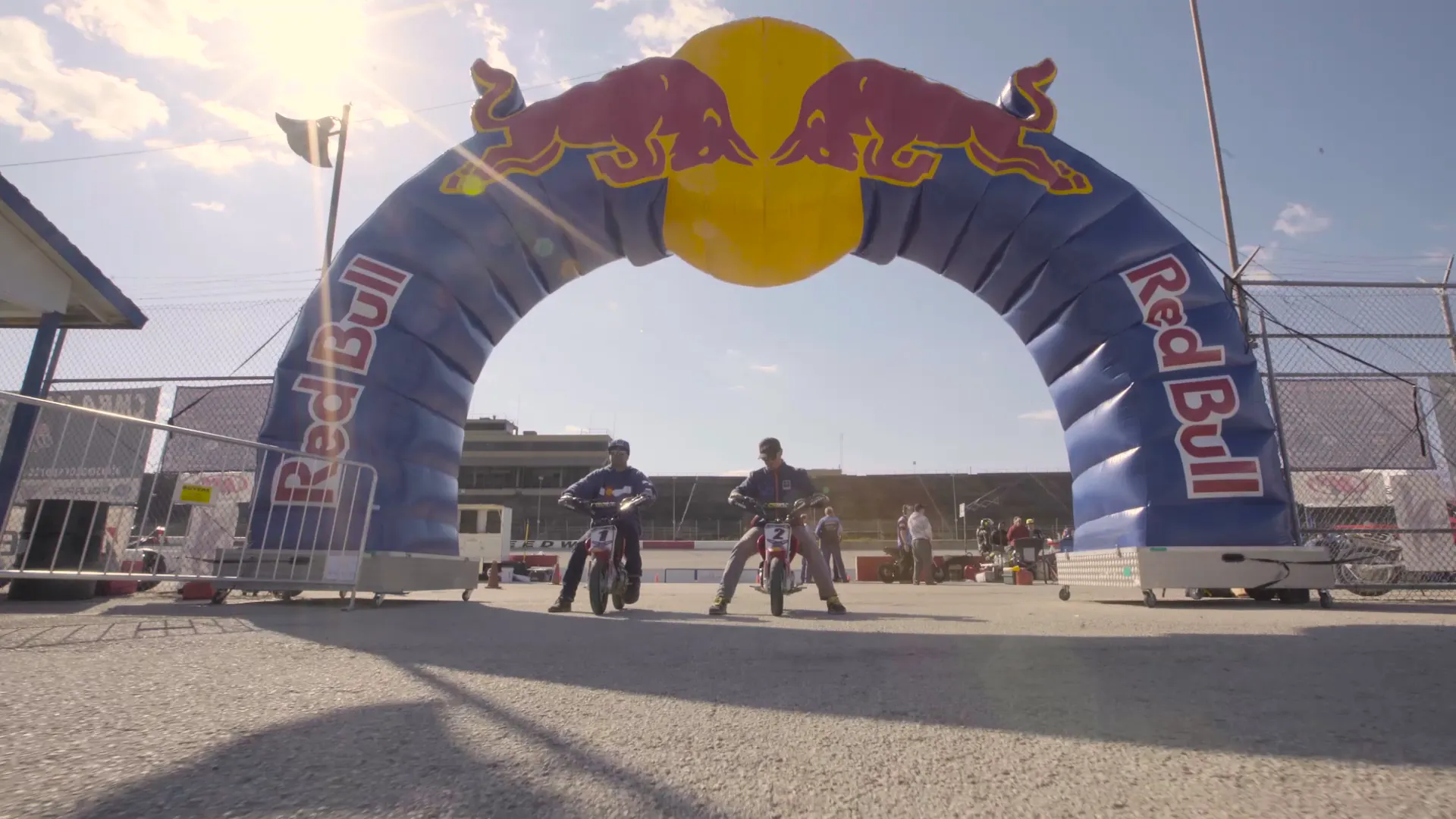 Riders lined up under the inflatable Red Bull arch