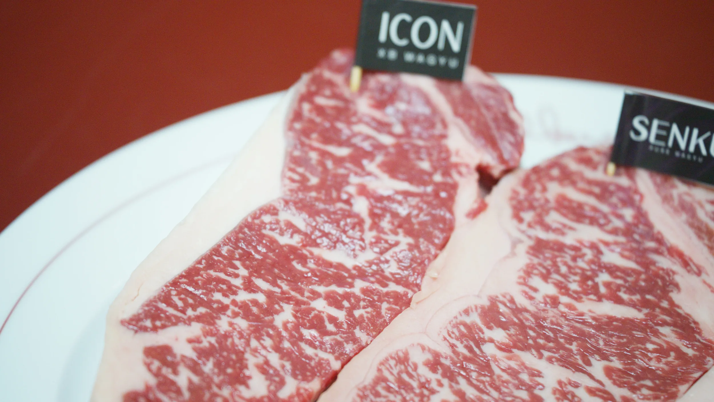 Close marbling on raw ICON and Senku striploins
