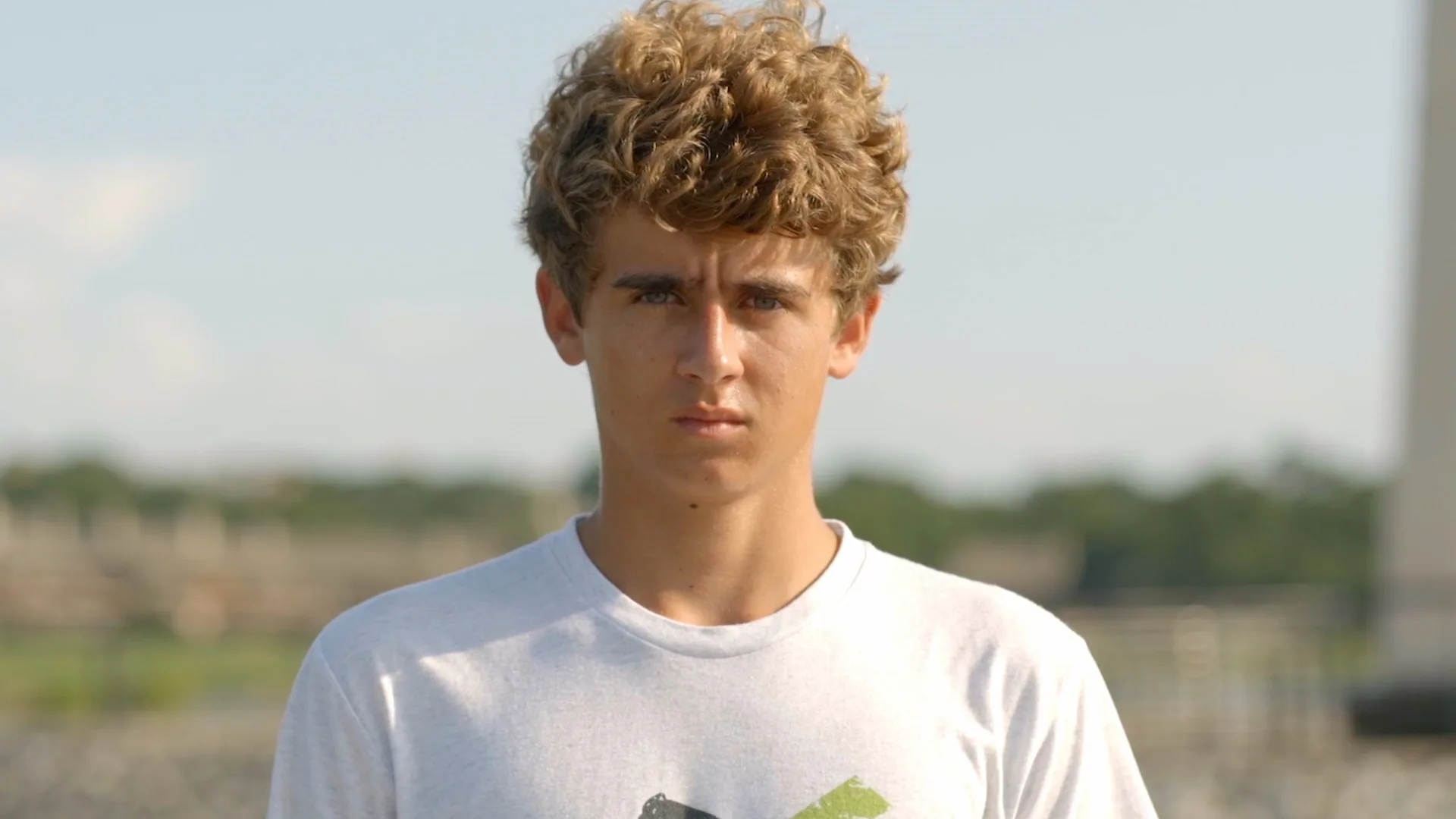 Portrait of Parker Payne by the lake