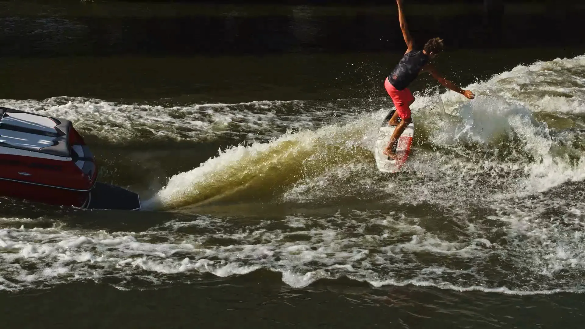 Parker Payne popping off the wake just behind the Supra's stern