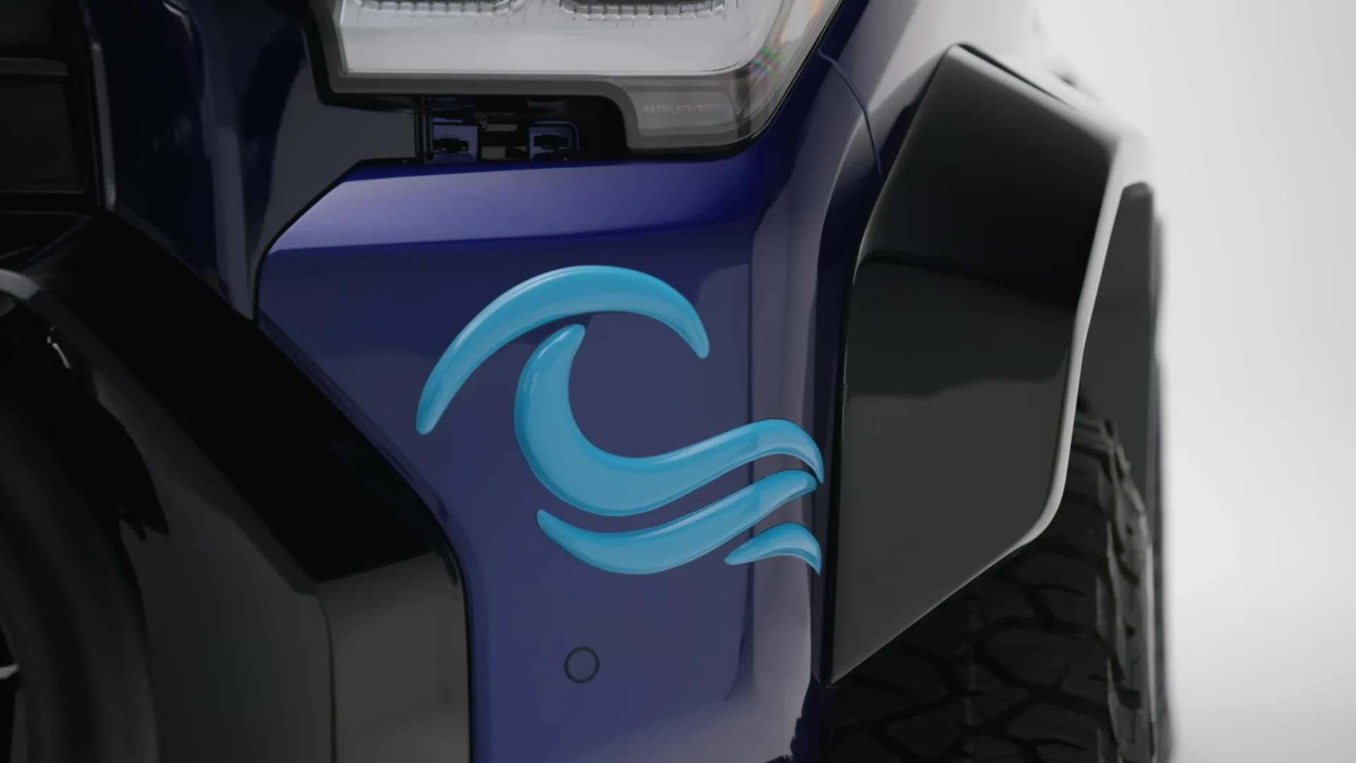 Close detail of the wave badge on the TRD Surf fender
