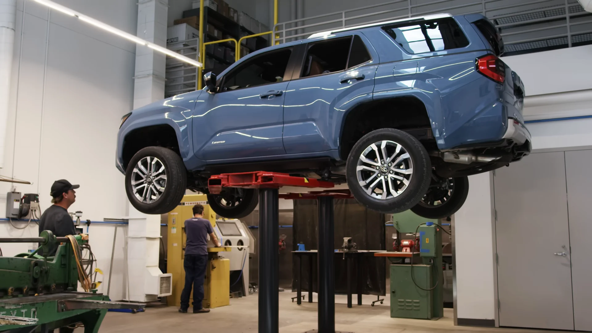 The 4Runner up on a lift in the TRD fabrication shop